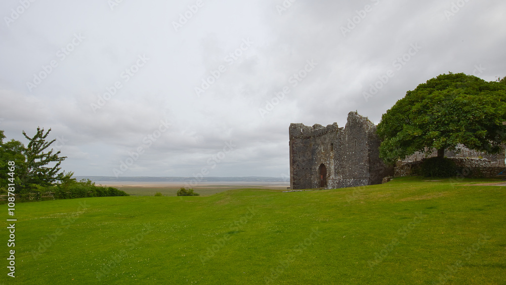 Weobley Castle overlooks the marshes and mudflats of the Gower Peninsula. Weobley Castle overlooks the marshes and mudflats of the Gower Peninsula.