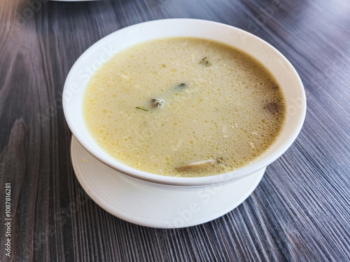 Tasty Mushroom soup in white bowl