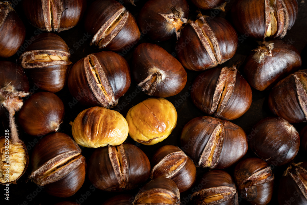 Roasted Chestnuts with Cracked Shells - Perfect for Autumn Treats Roasted Chestnuts with Cracked Shells - Perfect for Autumn Treats