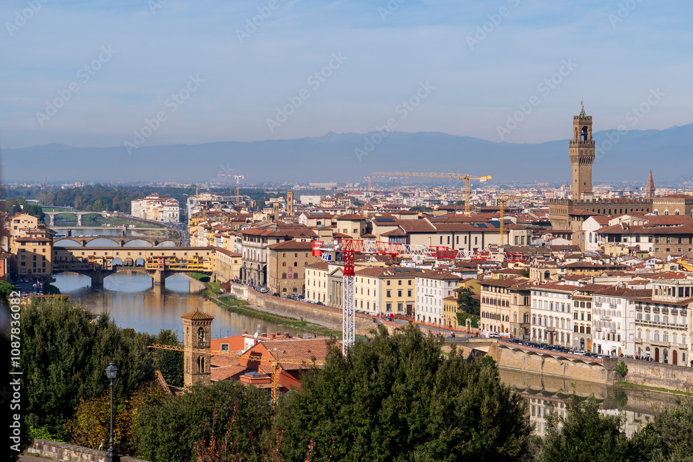 Obraz premium Florence, Italy - November 5, 2024: Florence cityscape and The Ponte Vecchio (Old Bridge).