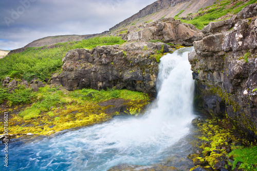 Göngumannafoss - one in a serie of 7 waterfalls leading to the famous Dynjandi waterfall in the Westfjords region of Iceland photo