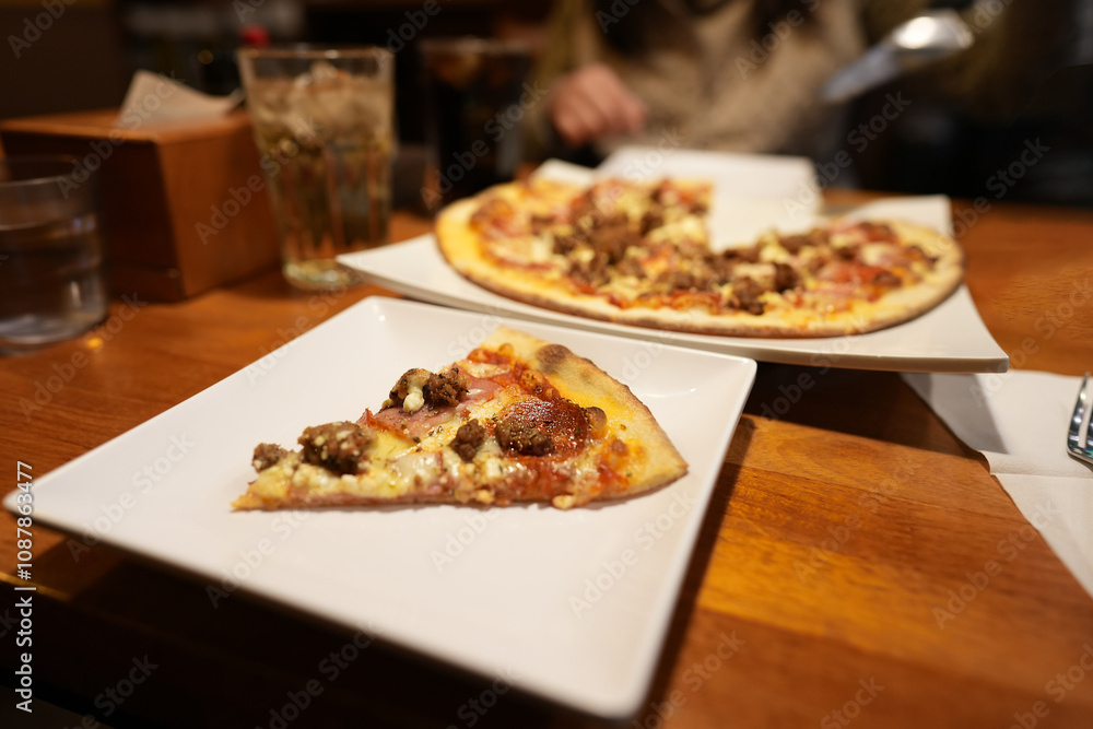 Slice of Pizza on a Square Plate Slice of Pizza on a Square Plate