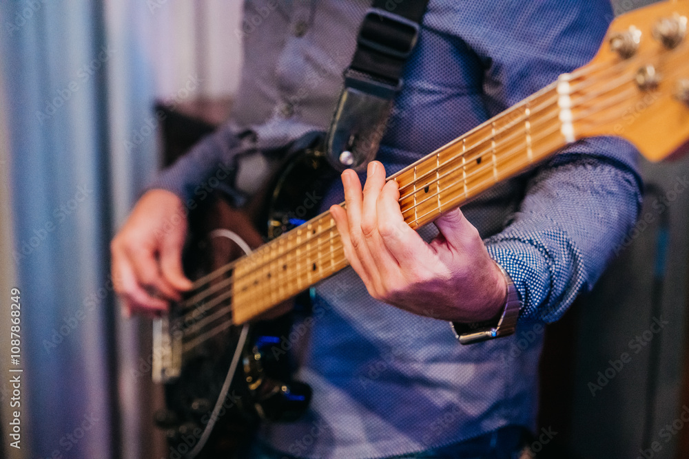 Electric bass guitar player hands, live music Electric bass guitar player hands, live music