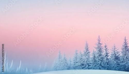 Winter morning landscape with snow covered trees and a pastel sky at dawn