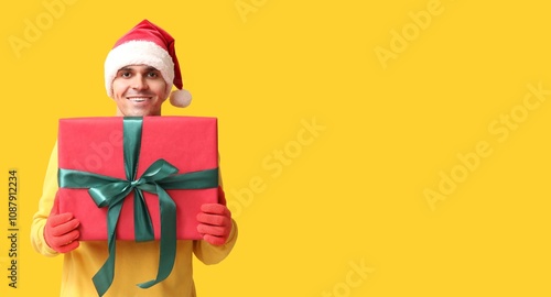 Handsome young man in Santa...