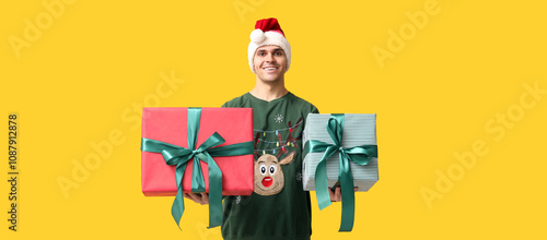 Handsome young man in Santa...