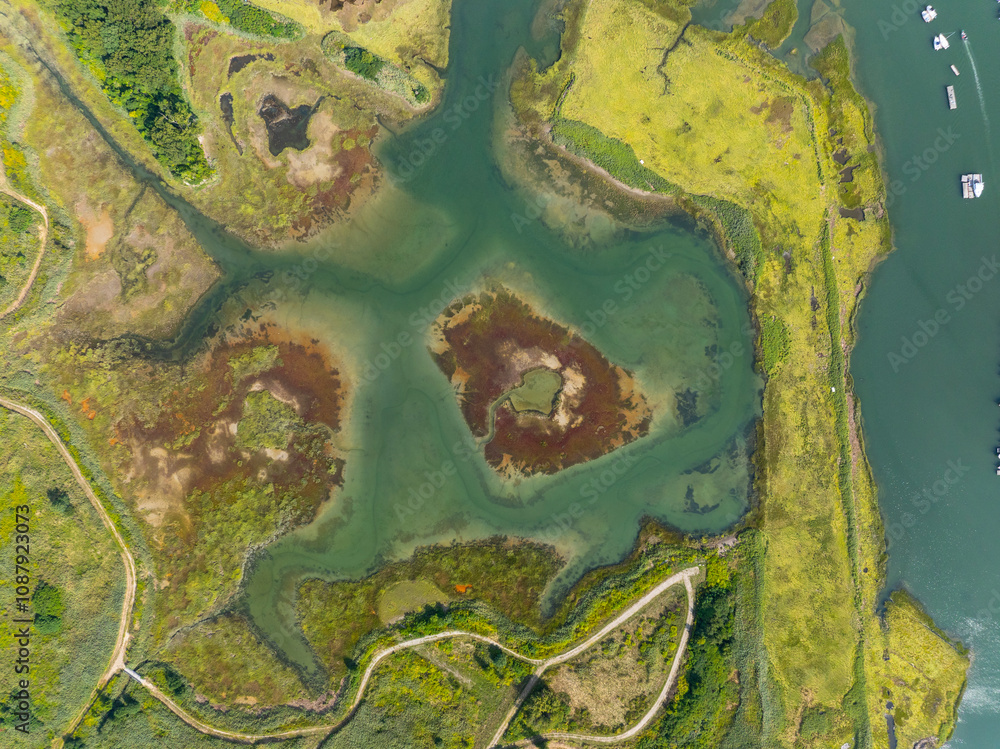Broad Meadows Marsh aerial view between Town River Bay and Quincy Bay in city of Quincy, Massachusetts MA, USA. Broad Meadows Marsh aerial view between Town River Bay and Quincy Bay in city of Quincy, Massachusetts MA, USA.