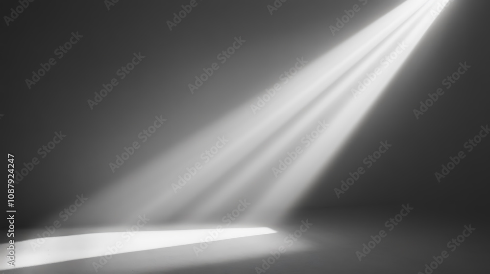 Light gray background with a beam of light shining down, creating an empty space for product display or presentation Light gray background with a beam of light shining down, creating an empty space for product display or presentation