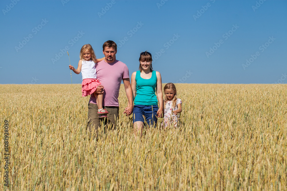 Portrait of a young family with two children Portrait of a young family with two children
