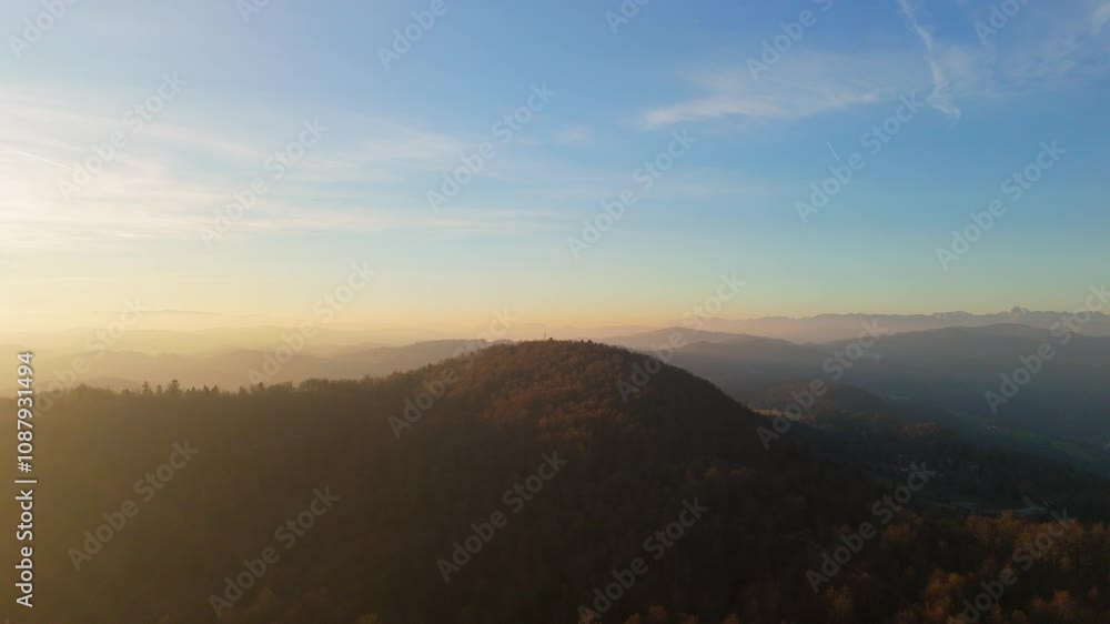A hill in the sunset, drone video, aerial shot A hill in the sunset, drone video, aerial shot