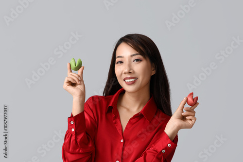 Young Asian woman with colo...