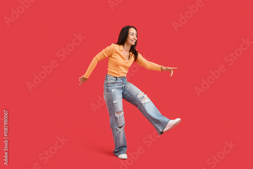 Happy middle-aged woman dan...