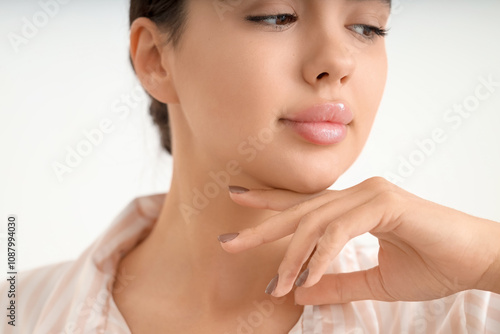 Beautiful young woman with ...