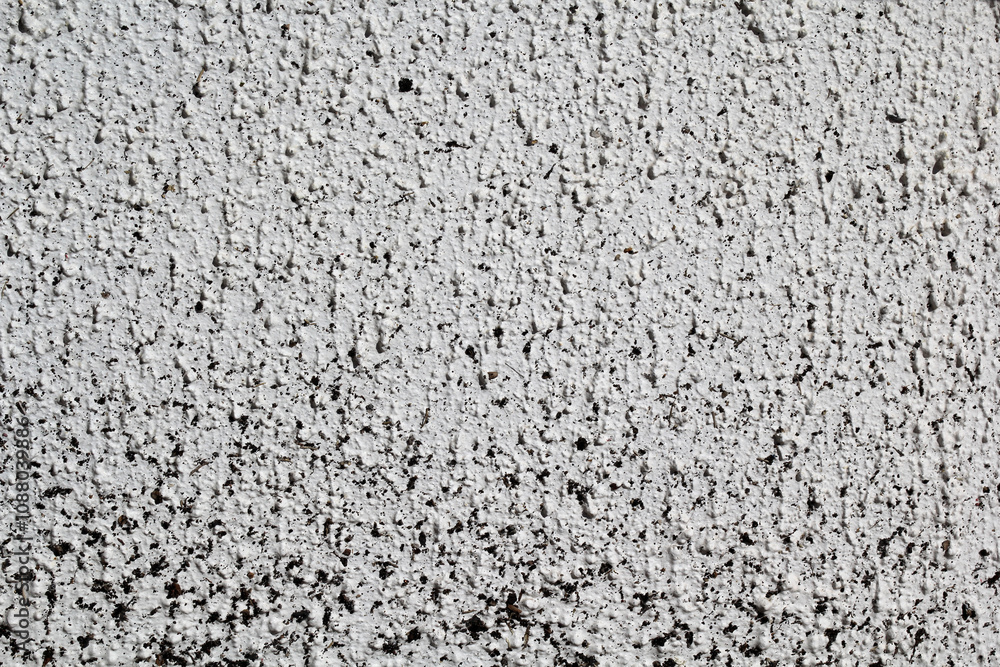 White coarse concrete stucco wall abstract textured background White coarse concrete stucco wall abstract textured background