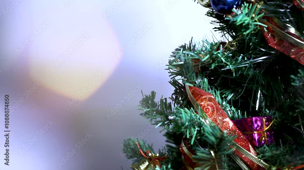 Christmas tree detail with blurred blinking lights. Christmas tree detail with blurred blinking lights.