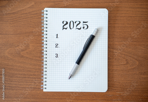 Obraz na płótnie Notebook with 2025 Goals for New Year Resolutions w salonie