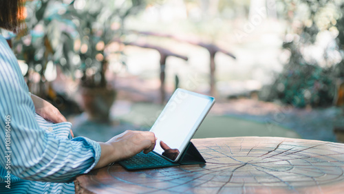 Obraz na płótnie business using tablet check and review digital document marketing on cloud with internet network, working outdoors anywhere, access database online to era technology fast job, connected wireless. w salonie