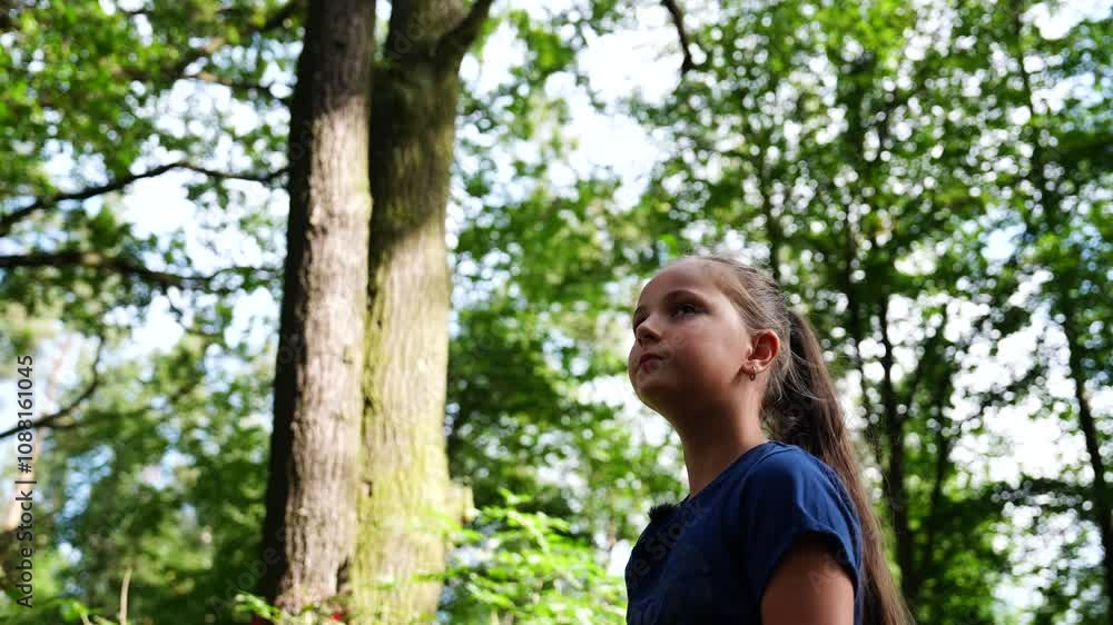 Close up of young girl look around, search and call for help in forest Close up of young girl look around, search and call for help in forest