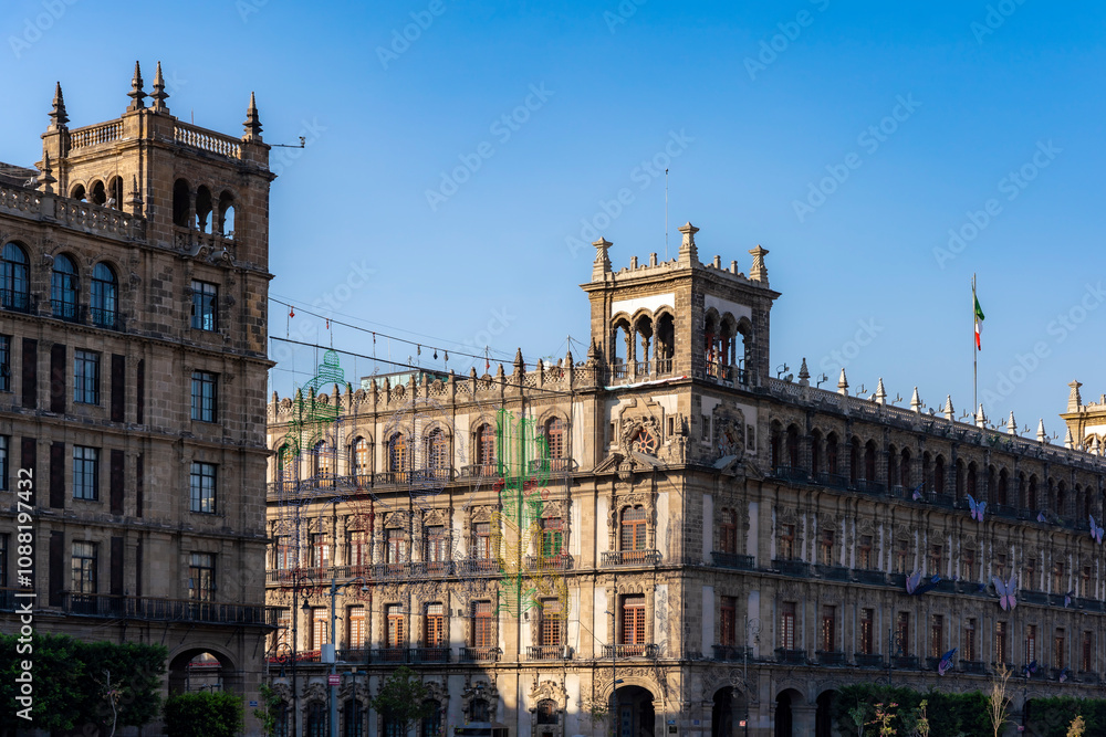 Side buildings in Zocalo Square, Mexico City, showcasing stunning colonial architecture, ornate facades, and historic charm on a sunny morning. Side buildings in Zocalo Square, Mexico City, showcasing stunning colonial architecture, ornate facades, and historic charm on a sunny morning.