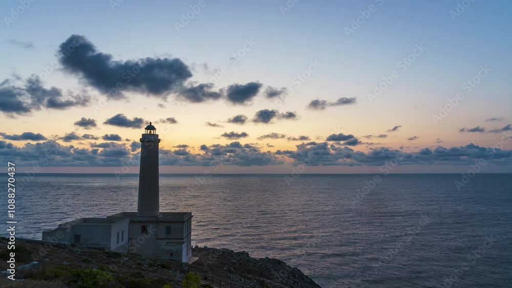 Timelapse of sunrise at Palascia lighthouse, Italy easternmost point. Stunning clouds drift over the Adriatic Sea as the sun rises Timelapse of sunrise at Palascia lighthouse, Italy easternmost point. Stunning clouds drift over the Adriatic Sea as the sun rises
