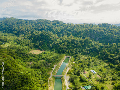 Breathtaking aerial drone view of countryside with waterway canal at Kampung Wai, Perlis, Malaysia photo