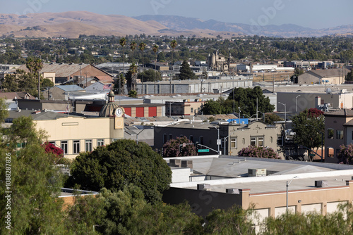 Hollister, California, USA - September 2, 2024: Afternoon light shines on buildings in the historic downtown district. photo