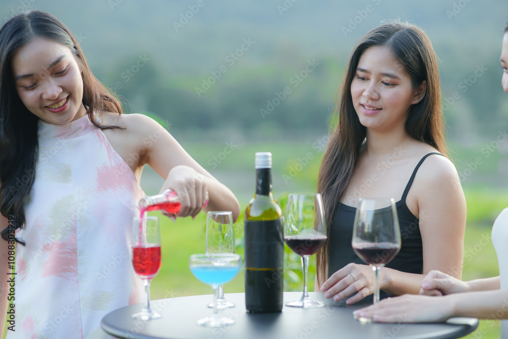 Asian women celebrate, meet and talk in bars. Tourist attractions, beautiful lights Asian women celebrate, meet and talk in bars. Tourist attractions, beautiful lights