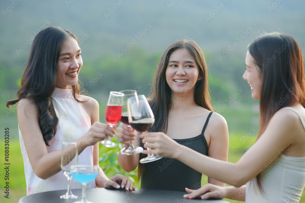 Asian women celebrate, meet and talk in bars. Tourist attractions, beautiful lights Asian women celebrate, meet and talk in bars. Tourist attractions, beautiful lights