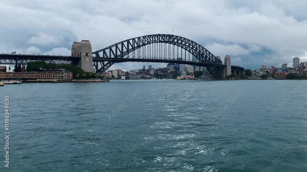 The iconic Sydney Harbour Bridge spans the harbor, showcasing its impressive steel arches and connecting the vibrant cityscape, a testament to Australian engineering. The iconic Sydney Harbour Bridge spans the harbor, showcasing its impressive steel arches and connecting the vibrant cityscape, a testament to Australian engineering.
