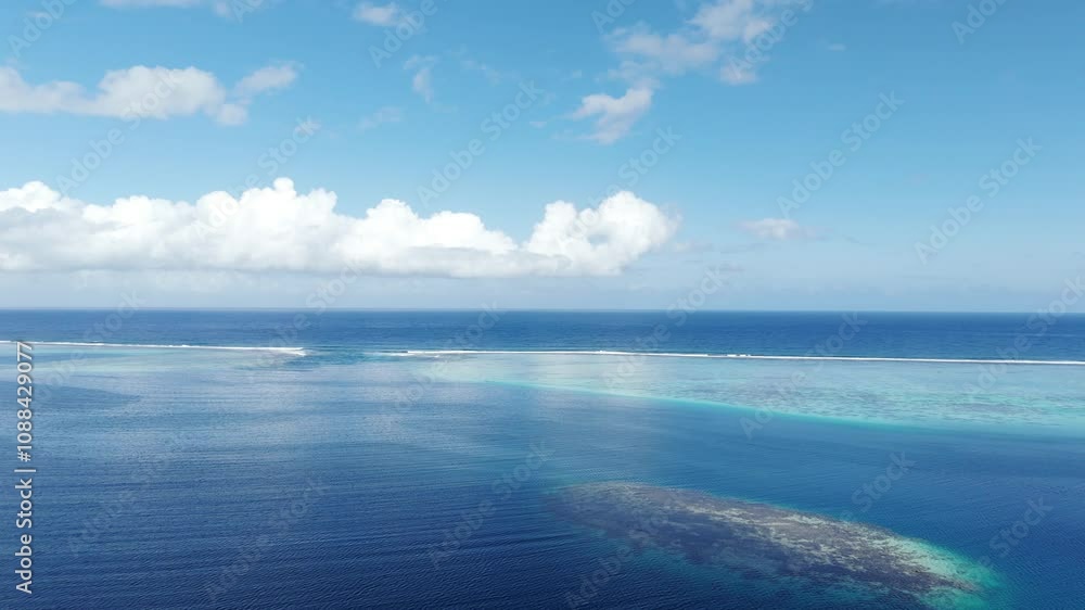 Aerial View of South Pacific Ocean In Daytime In Tahiti Island, French Polynesia. - pullback shot Aerial View of South Pacific Ocean In Daytime In Tahiti Island, French Polynesia. - pullback shot