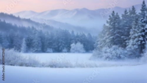 Serene and dreamy blurred winter landscape with soft snow and muted light for a tranquil background