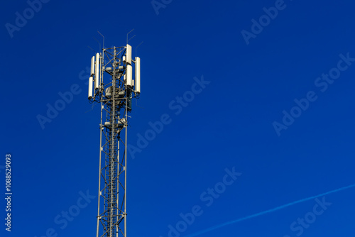 A tall mast with devices for transmitting television and mobile telephony signals in 5G technology