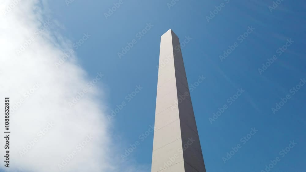 Low angle at Obelisk monument of Buenos Aires city Argentina, over Sunny Skyline Low angle at Obelisk monument of Buenos Aires city Argentina, over Sunny Skyline