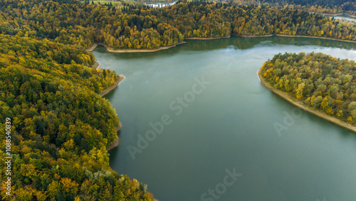 Fototapeta Naklejka Na Ścianę i Meble -  Peaceful Autumn Over Solina Lake with Bieszczady Mountains in Background