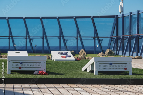 Bean Bag toss field boards on outdoor deck of classic cruiseship cruise ship liner for sportive entertainment photo