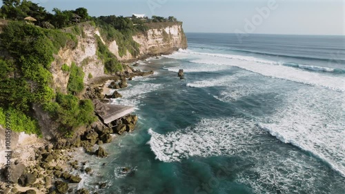 Drone footage of coastline ocean and cliffs in Uluwatu, Bali, Indonesia