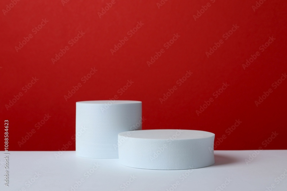 White podiums on color background White podiums on color background