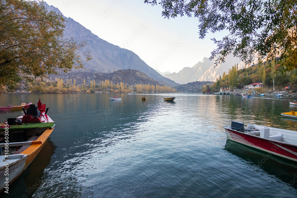 Fototapeta premium Landscape of Upper Kachura lake in Skardu, Pakistan. Tourists can enjoy trekking, hiking and boating. The lake is surrounded by wonderful sights to give a sense of relief, peace and tranquility.