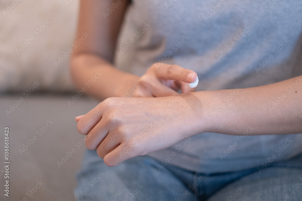 Woman massing rubbing wrist suffering from wrist sprain pain after physical injury arthritis inflammation Woman massing rubbing wrist suffering from wrist sprain pain after physical injury arthritis inflammation