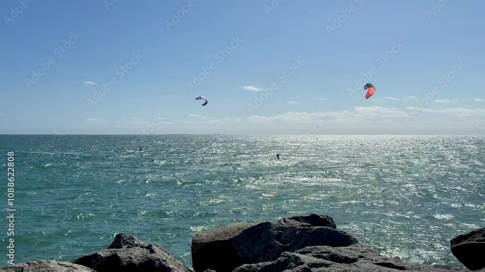 2 Kite Surfers off Cottesloe Groin, blue Indian Ocean, Western Australia 2 Kite Surfers off Cottesloe Groin, blue Indian Ocean, Western Australia