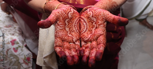 woman in mehendi hands an indian tatoo
