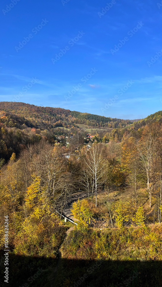 Landscape, autumn mountains covered with forest with blue sky, Poland Landscape, autumn mountains covered with forest with blue sky, Poland