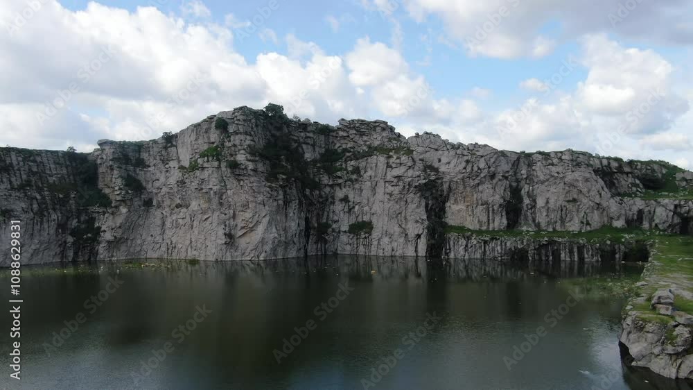 Beautiful shot of rock, with water inside of it Beautiful shot of rock, with water inside of it