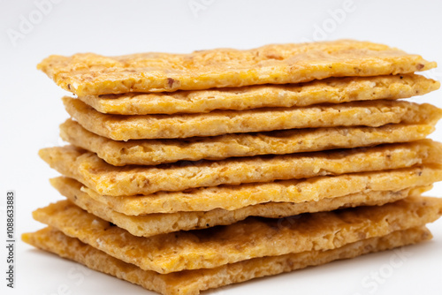 Snacks in gray . homemade gourmet copy concept. stack of small breads on grey with a stack of crumbs. a stack of small snacks on a gray with a stack of lifestyle white bread.