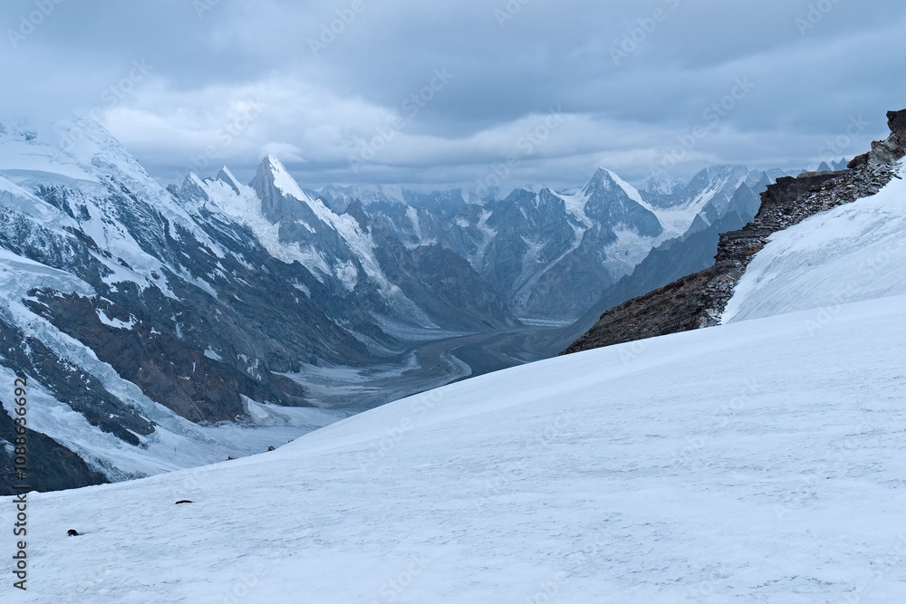 Fototapeta premium View from Gondogoro La mountain saddle, 5,585 meters high, of Gondogoro Glacier and Laila Peak. Karakoram Mountains. Gilgit-Baltistan region. Pakistan. Asia.