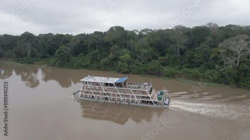 Aerial view of the cruise ship crossing the congo basin rainforest in the democratic republic of Congo.