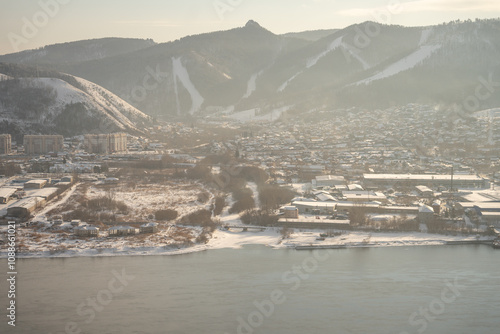 Awesome winter landscape. Top view of the Yenisey River among scenic mountains, Siberia. Krasnoyarsk photo