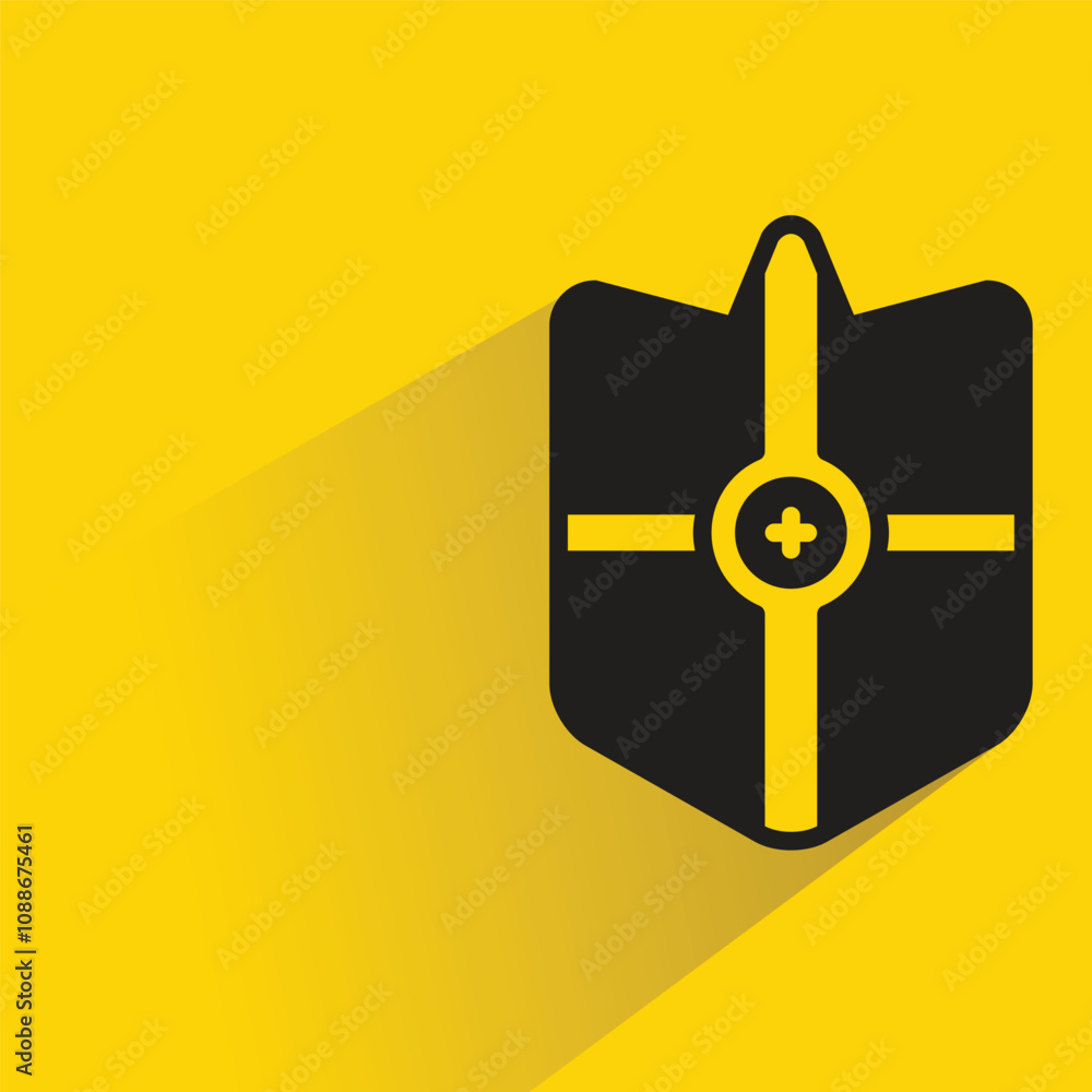 shield icon with shadow on yellow background shield icon with shadow on yellow background