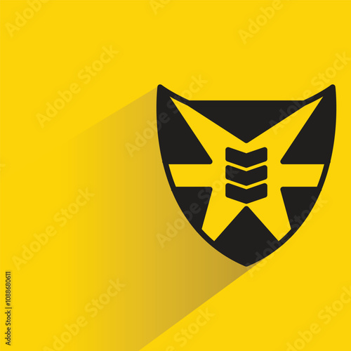 shield badge with shadow on yellow background