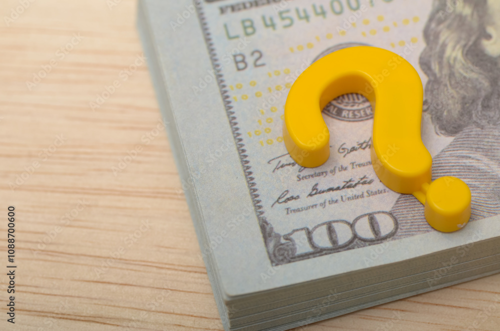 Financial Uncertainty Concept: Money Banknotes with Question Mark Symbol Depicting Economic Doubts and Decisions Financial Uncertainty Concept: Money Banknotes with Question Mark Symbol Depicting Economic Doubts and Decisions
